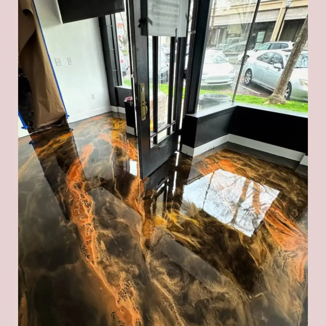 A floor that has been polished and is in front of a window.