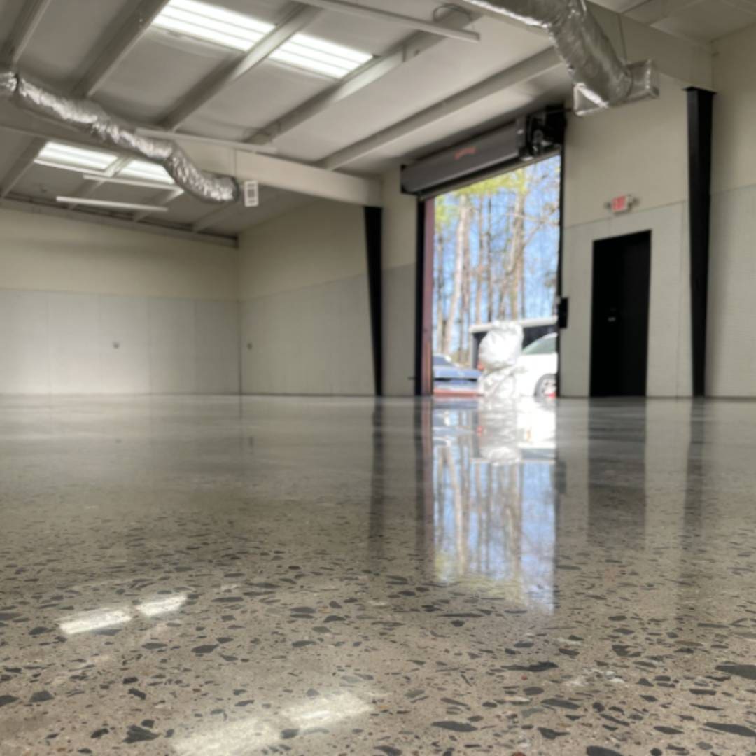 A room with a large floor that has been polished.